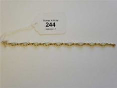 A 14ct gold and opal set bracelet,