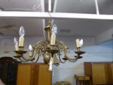 A brass eight branch chandelier