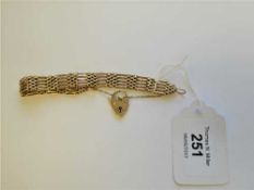 A 9ct gold padlock bracelet, 19.
