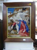 A rosewood framed tapestry of a religious scene