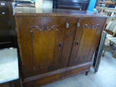 A Continental walnut sideboard