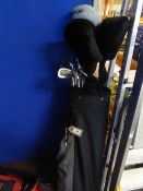 A Wilson golf bag containing a set of Lynx black Cat irons,