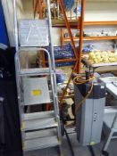 A Titan garden chipper shredder together with two sets of aluminium steps