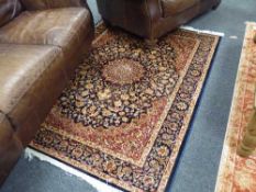 A fringed Persian Keshan rug,