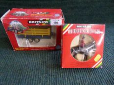 Two boxed Britons pieces : Q E II figure on horseback and 9555 animal trailer
