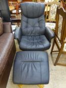 A black swivel relaxer armchair with stool