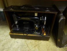 A Singer sewing machine in case