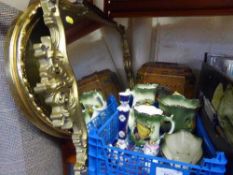 Two decorative gilt framed mirrors together with a wooden table box and basket of assorted china
