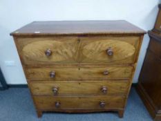 An early Victorian inlaid mahogany secretaire chest