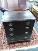 A 19th century inlaid mahogany four drawer chest of small proportions