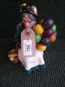A Royal Doulton figure - The Old Balloon Seller HN 1315