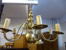 A brass eight branch chandelier