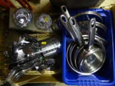 A box of assorted kitchen utensils, marble cutting board,