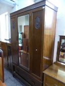 A three piece oak bedroom suite