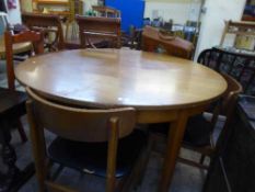 A teak dining table and four chairs