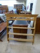 A stripped pine wall shelf