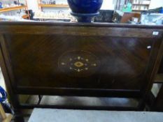 A set of Victorian inlaid mahogany bed ends