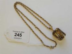 A large citrine in 9ct gold mount,