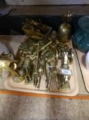 A tray of assorted brass ornaments, rocking horses, Shire horses, cannons,