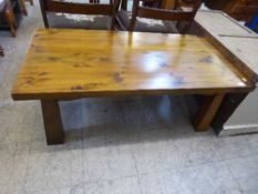 A contemporary pine rectangular coffee table