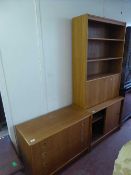 A mid twentieth century teak bureau bookcase together with matching four drawer chest