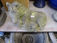 A garden figure of a horse with foal