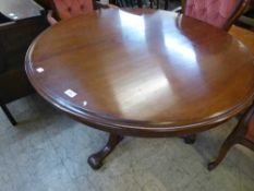 A Victorian mahogany breakfast table