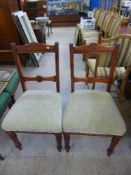 A set of four Edwardian dining chairs
