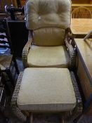 A wicker conservatory gilder chair with stool,