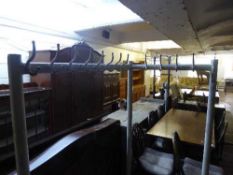 A mid twentieth century metal L-shaped changing room coat rack