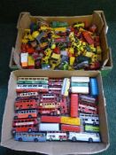 Two boxes of die cast construction and farm vehicles,