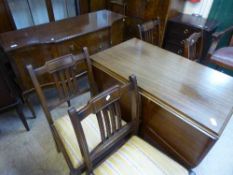 A mahogany six piece dining room suite