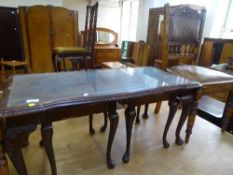 A mahogany nest of three tables and a pair of chairs