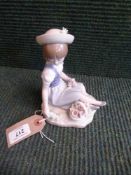 A Lladro figure - Girl seated with basket of flowers