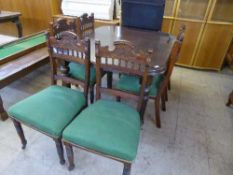 A late Victorian mahogany wind out dining table,