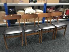 Four mid 20th century teak dining chairs