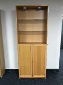 An Ikea beech double door cabinet