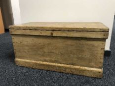 An antique pine blanket box