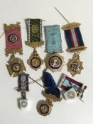 A collection of lodge medals,