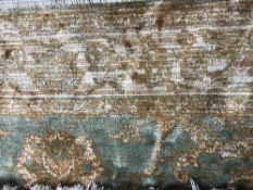 A fringed silk finished Zeigler rug,