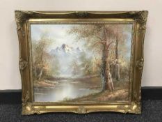 A contemporary gilt framed oil depicting a forest stream