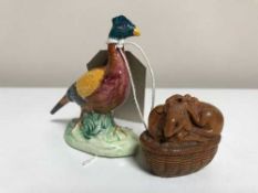 A Beswick figure of a pheasent together with a carved hardwood netsuke depicting two mice in a