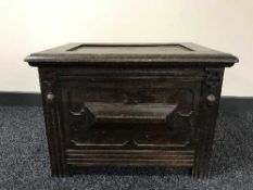 An Edwardian oak coal receiver with liner