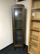 An oak sentry door display cabinet