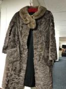 A lady's 3/4 length fur coat