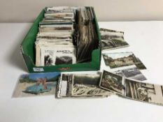 A box containing a quantity of mixed twentieth century postcards