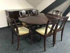 An eight piece mahogany Regency style dining room suite