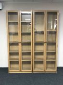 Two contemporary Ikea double door glazed bookcases