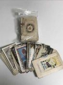 A collection of early 20th century postcards in including WWI examples (Q)