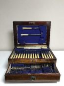 A mahogany canteen of cutlery retailed by The Northern Goldsmiths